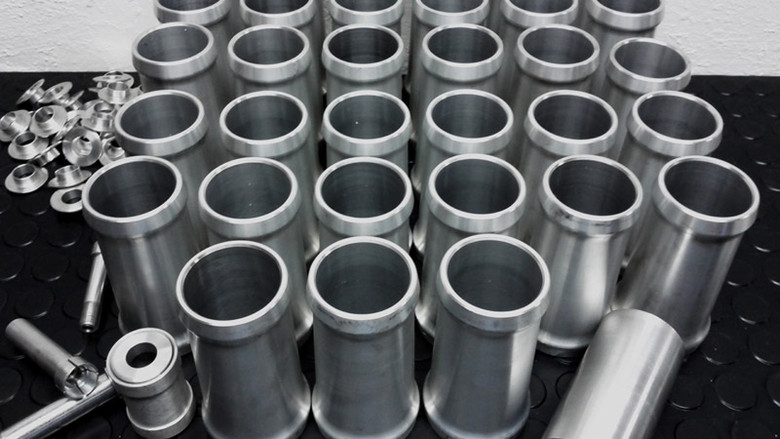 A new batch of headtubes waiting to be partnered with the rest of the frame. A new batch of headtubes waiting to be partnered with the rest of the frame.