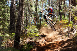 Plow down the steep, loose bombholes section? Nope, send it, with a table for good measure. Ball's got balls.