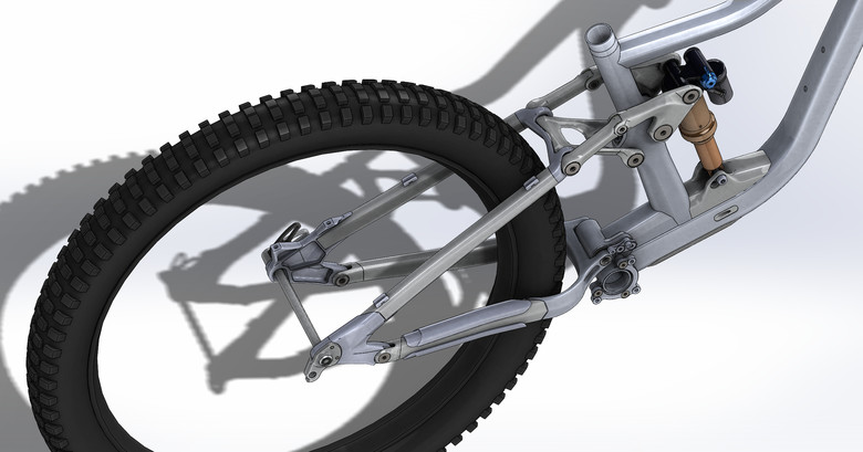 Rear spindle for mountain bike clearance