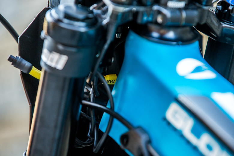 The colored wires are a fair giveaway that something isn't stock about the bike.