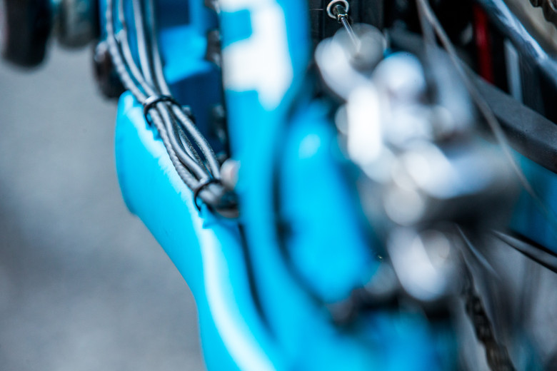 The extra bundle of wires running the length of the frame are neatly organized and strapped down or tucked away.
