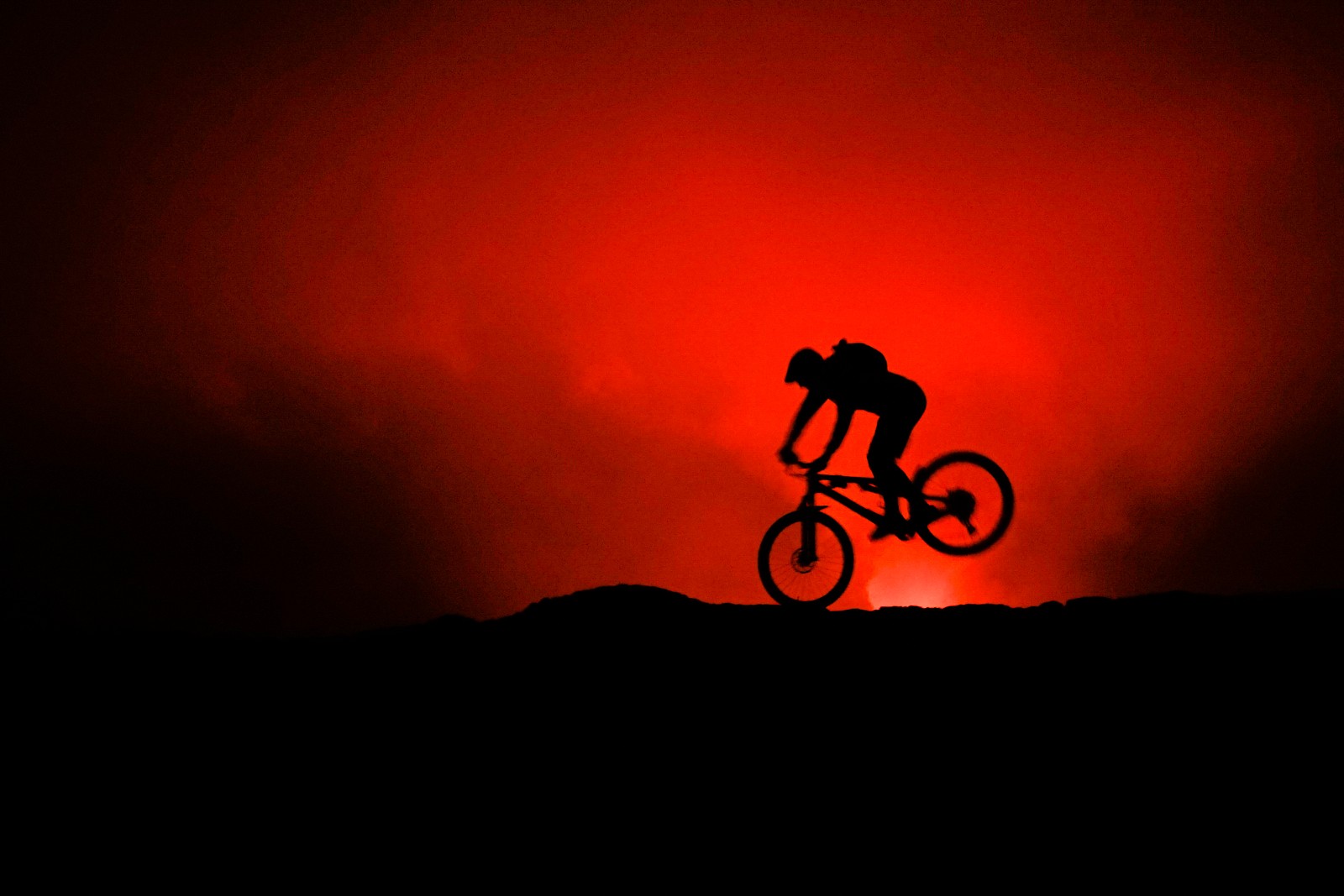 Endo stoppie at the edge of erupting Halemaumau Crater FatNutz