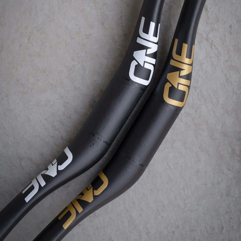 OneUp-Components-Carbon-E-Bar-Black-Gold-966.jpg?VersionId=0P9