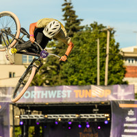 Rider whipping in front of the MainStage music at Northwest Tune-Up