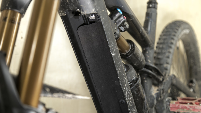 That's a velcro and neoprene cover to secure cables. Pretty trick.